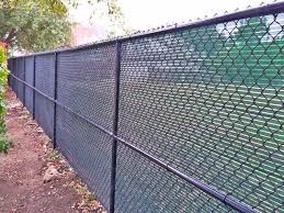 CHAIN LINK FENCE SUPPLIERS.
chain link fence are installed at:
– recreation ground
– tennis court
– children playgrounds
– commercial property,
– basketball court
– track and field
– football fields
– industrial general safety and security fence
– garden fencing

Also the design and types of fencing depends on ‘where the fence in installed’ and also the level of security required.

We supply & manufacture these ISO 9001:2015 certified playground chain link fence all over UAE (Dubai, Sharjah, Ajman, Abu Dhabi, Ras Al-Khaimah, Al Ain, Fujairah) & also export it to Oman (Salalah, Muscat, Sohar, Nizwa, Barka, Ibri) | Saudi | Iraq | Kuwait | Bahrain.

Protection and coating of playground chain link fence
At Muzalaat, we strive to make all our goods long lasting and of good quality. Therefore in order to make these playground chain link fence durable and long lasting for the weather condition of Middle East, the wires used in fencing are galvanised and the thickness is determined according to purpose of installation and then the PVC coat is applied and also BSEN 10224-2 factor also comes in place.

The RAL color is also customised and determined according to our clients needs.. all these elements are then hot dipped galvanised to BS 1434 & polyster or PVC coat.
​
CHAIN LINK FENCE INSTALLATION.
​Details on chain link fencing | Wire type fencing | Mesh fencing – Dubai
To make the chain link fencing installation process much smoother and faster we use the following technique. This process also makes the fencing secure. The chain link fence are made by twisting wires together to form spiral shape which is flattened. It is because of this design chain link or wire link fence are also called cyclone fences or diamond mesh fences. We follow the process of twisting the wire continuously spirally around the blades and winds when it reached the far end of the fence then the wire is cut. The entire fence is moved up when the wires are spirally pressed during the second cycle. This process is repeated again creating a overlap at the end of every wire spiral twisting. Then to clamp the both ends a tool is used after adding few more twists which makes the joint permanent.

Raw materials used for our chain link fence
– BS4102 and hot dip galvanized to BSEN10244 from (40-350 grams/Sq. meter) or
– PVC coated steel wire
These material makes the chain link fence last longer and withstand the harsh climate of Dubai, Sharjah, Ajman, Abu Dhabi, Ras Al-Khaimah, Al’Ain, Fujairah and Oman (Salalah, Muscat, Sohar, Nizwa, Barka, Ibri) | Saudi | Iraq | Kuwait | Bahrain

Color of our chain link fence
– Standard popular color in Middle East is dark green but this can be customised according to the needs of our clients.

Why GMI chain link fencing
– with an ISO 9001:2015 certified factory in Ajman, we manufacture, supply and install chain link fence in accordance to the rule book and all these fencing installation in Dubai, Sharjah, Ajman, Abu Dhabi, Ras Al-Khaimah, Al’Ain, Fujairah are carried under the supervision of our Fencing Expert.

– the expert handling the installation has been handpicked and have many years of experience and they also have to get the right certificate of Health and Safety regulatory bodies

– FREE ADVICE | DOOR STEP DELIVER | READ STOCK | FREE INSTALLATION* are few of the features that we offer on our chain link or mesh wire installation

– our wide network also helps us to export these chain link fencing all over Oman (Salalah, Muscat, Sohar, Nizwa, Barka, Ibri) | Saudi | Iraq | Kuwait | Bahrain
CHAIN LINK FENCE CONTRACTOR
NOTHING PROTECTS LIKE CHAIN LINK
Chain Link Fence
If you’re looking for an affordable, secure fencing material for your backyard, driveway, pool or other outdoor space, chain link fencing from AL MUZALAAT  Fence Company is a great option.

AL MUZALAAT chain link fencing offers an uncompromising level of security and visibility that no other fence design can offer. Substantial steel links, posts, and fittings make our chain link fencing the perfect choice for safety-minded customers. Today’s, chain link fences now come in a variety of colors and are designed to blend into the natural landscapes.

Since we opened the doors in 2004, many businesses across the UAE have selected chain link fences from AL MUZALAAT Fence offers superior security AND fits into the classic UAE architecture. Our reputation for creating and installing beautiful chain link fences quickly spread through the UAE You can see our work at residences and businesses across DUBAI, SHARJAH, AJMAN, UMM AL QUWAIN. RAS AL KHAIMAH, FUJAIRAH, AL AIN, ABU DHABI, UAE.

Interested in seeing how chain link fencing could serve your home security needs? Browse through our fence gallery to view images of our past installations at homes across the UNITED ARAB EMIRATES!

At MUZALAAT Fence Company, it’s our goal to provide high-quality fencing products and a level of service unmatched by any other fence company in the UAE or beyond. Our experienced fence installation specialists will work with you to find the best fencing solution for your needs and individual space, ensuring you enjoy the benefits of your requirement  fence for years to come. To get started, contact Al Muzalaat Fence Company today, fill out the free service quote request form to the right, or visit our Locations page to find Al Muzalaat office nearest to you!
Contact Us E-MAIL maqavitents@gmail.com
 Address: 6 Street #43 - Sharjah United Arab Emirates. 
CAR PARKING SHADES SUPPLIER 0543839003CHAIN LINK Fence Manufacturers and Suppliers in Dubai, Sharjah, Ajman, Umm Al Quwain, Ras Al khaimah, Fujairah, Al Ain, Abu Dhabi, And  UAE.