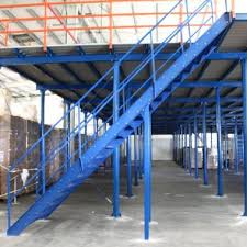 Our Industrial Structures Mezzanine Systems are available as the freestanding and rack- or shelving-supported types. These mezzanines are offered with a galvanized finish, an easy-to-install handrail which can accommodate gates, 8-bolt construction, and galvanized stairs with nonslip tread.
​
Equipment Roundup Manufacturing has manufactured products such as mezzanines. Our mezzanine structures include mezzanine systems, mezzanine floors, industrial mezzanines & plant mezzanines. Like other customers, you will discover the difference our enthusiastic can-do attitude brings. We help you discover solutions to problems you may not have considered. Your success is our success.
​
Whether you have small storage space or a large warehouse, you can potentially double your available storage space by considering steel mezzanine floors and make better use of the available height in the warehouses. With us, you can get structural steel mezzanine floors to your industrial storage system, providing more space and strong racking, which is safe and organized. We provide you with the best fabrication works services, whether you want rack based steel mezzanine floors or two-tier shelving system.
Features of Our Steel Mezzanine Floors
Increased Space in Industrial Warehouses.
Easy to Assemble & Comes in Variety of Sizes & Constructional Systems.
Non-Slip Surface, Galvanized.
Durable Solution for Storing Heavy Loads.
Best-Quality-Steel-Mezzanine-Floors-Suppliers-Dubai-UAE
We offer the Best Fabrication Works Solution for Your Storage Space
Our dedication towards clients and unbeatable experience in the industry make us the leading racking & shelving solution providers in UAE. Hence, you can expect maximum strength and durability for your industrial storage spaces.

Pallet Racking
Drive -In / Drive through Racking
Push Back Racking
Cantilever Racking
Gravity Rack
Mezzanine Floor
Radio Shuttle Racking
Carton Live Racking
Stacking Rack
Steel Platform
Automatic Racking System
Shelving
Wire Mesh Products
Racking Accessories
Logistic Equipment