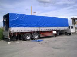 TRUCK COVERS
​Truck Companies need truck tarps that will last for multiple long haul journeys and this is were Exclusive Tarps comes to your service. We make sure we provide quality long lasting tarps. Our truck tarps have high density weave and double stitched grommets. Exclusive Tarps specializes in truck tarps that are equipped with a thick PVC Coating.

Benefits of Truck Tarps:
- Safety from external weather conditions
- Strong Long lasting Material (Heavy Duty Material)
- 100% Waterproof Coverage

Product Usage:
PE Tarpaulin: Outdoor Storage (Waterproof and has heat resistant Properties).
Dutarp: S5220R, Truck Covers, Boat Covers, Tents, Tarpaulins and Equipment Covers.

Load Metrics (uses 8 credits)Keyword
truck tarpaulin sizes
truck tarpaulin prices
lorry rain cover
tarpaulin for trucks
used lorry tarpaulin for sale
truck plastic cover
truck cover
tarpaulin sheet for trucks
canvas tarpaulin uae
dutarp
used lorry tarpaulin for sale
lorry rain cover
tarpaulin
canvas waterproof tarpaulin
orchid tarpaulin
tarpaulin sizes
tarpaulin price in kenya
kenya canvas prices
africa pvc industries ltd
pick up canvas covers in Nairobi
tarpo industries
tarpaulins for sale
TRUCK TARPAULINS
​Truck tarpaulins
Covers for your transport vehicles
The tarpaulin on a truck is the company’s calling card. Both protection of the transport cargo and the advertising place high demands on the material for the company. MEHLER TEXNOLOGIES® tarpaulin material ranks among the premium products in the area of truck tarpaulins.
The fabric type, coating and surface lacquering have a huge influence on the tensile strength, tear resistance, flexibility, durability and printability.
Depending on the use and the load, there are truck tarpaulins in various weights and widths and with various features and many attractive colours.

Products for this application
POLYMAR®
TRAFFIC
RIEMCHEN 2 mm

Show product
POLYMAR®
TRAFFIC
TIR - Verschluss

Show product
VALMEX®
PRINT TRUCK
print TRUCK glossy

Show product
POLYMAR®
TRAFFIC
SILVER

Show product
POLYMAR®
TRAFFIC
HOCHGLANZ

Show product
POLYMAR®
TRAFFIC
HALBPANAMA

Show product
POLYMAR®
TRAFFIC
SILVER

Show product
POLYMAR®
TRAFFIC
HOCHGLANZ

Show product
POLYMAR®
TRAFFIC
HOCH GLANZ

Show product
POLYMAR®
TRAFFIC
Side Curtain silver
PVC TARPAULIN TRUCK COVERS
PVC Tarpaulin Truck Covers in Dubai, Sharjah, Ajman, Umm Al Quwain, Ras Al Khaimah, Fujairah, Al Ain, Abu Dhabi, UAE and EXPORT TO GCC Countries. Oman, Bahrain, Saudi Arabia, Doha Qatar, Kuwait, Africa, Egypt, and many more Countries.
Driving a truck can be a hazardous and difficult job. Drivers are expected to care for and look after their cargo. To keep it safe from any external elements, it is important to have a reliable and durable PVC Tarpaulin Truck cover from the best provider in the industry.

We are pleased to offer a wide range of high quality PVC Tarpaulin Truck Covers that will meet your needs. Truck companies need quality truck tarpaulins that are durable and will last for a long time. At our company, our standard material for truck covers is PVC or Polyvinyl chloride. The material may feel like it’s a rubber, but it is actually a high-density polyvinyl chloride with nylon mesh sandwiched in the middle in order to deliver more durability and strength. Due to the material’s thickness, it can efficiently withstand longer exposures to UV rays, thus lasts longer and is stronger.

The PVC Tarpaulin Truck Cover Benefits
No matter what your tarping needs, we are here to help. We manufacturer and sell custom-made and standard size protective covers and truck tarps that match your needs. Regardless of the industry you are in, we have dozens of grades and weights of protective material that will last and meet your budget. If you are looking to have a PVC Tarpaulin Truck Cover, here are the main benefits it provides:

Rot-proof, dust proof and waterproof
Comes in a variety of colors and sizes
Heavy-duty construction
Features excellent weather resistant performance
Excellent printability

PVC Tarpaulin truck covers do not only protect the cargo or materials being transported from various elements, such as pilferage, theft, etc. but also the company’s image. A truck cover can be designed and printed with your brand name or your company logo. This is done while adding very minimal weight to the truck in order to maximize the weight for the load.

Transported goods are protected effectively while you are promoting your business or brand. Truck covers offer a remarkable way for business owners to advertise their business, products or services. The type of the coating, fabric and surface painting has a huge impact on the print reproduction, durability, flexibility and tear-out resistance of the material. Depending on the operational demand and the application, truck covers are available in a variety of widths, finish, colors and weights.
TRUCK TRAPS
​Truck Tarps
Shop our Truck Tarps for on-the-go transportation tarps at affordable prices. Detailed craftsmanship ensures that these sturdy tarps stand up to the elements, punctures, wear and tear, and tough environments. Whether it’s lumber, refuge, steel, heavy equipment, or temperature-sensitive asphalt, Tarps Now has a truck tarp for any load. Our tarps are made from versatile, strong, and easy-to-handle materials including an 18-ounce vinyl coated fabric. They are available in standard and custom sizes for any trucking requirement including flatbeds, coil trailers, transfer trailers, dump trucks, and roll-offs.

We create truck tarps with a variety of weights, grades, colors, and vinyl material. The heat-sealed vinyl seams and double lock-stitched hems deliver sturdiness, versatility, and resilience. Select covers include welded, tack-stitched D-rings that provide high tension strength. Tarps Now also has a new line of lightweight, 10-ounce Vinyl Tarps that are easy to handle yet extremely strong. You can’t go wrong.
BOAT TARPAULINS COVERS
HEAVY DUTY POLY BOAT TARPS
These tarp covers for boats and recreation are made of heavy-duty laminated polyethylene material that boasts a 12x14 mesh count weave. These completely waterproof tarps for boats and recreational vehicles are both acid and UV resistant for added durability. They have reinforced corners and edges and come with a 1-year warranty.
heavy-duty-poly-tarps
heavy-duty-poly-tarps-reinforced-corner

MARINE WATERPROOF BOAT TARPS
These completely waterproof boat tarps are oversized to fit over seats, windshields, consoles, t tops, etc. They are super tear-resistant and the fabric is both acid rain and UV resistant. This is a version of the Heavy Duty Poly Tarps designed specifically for boats. It is made of the same 12x14 mesh count weave fabric. Reinforced corner guards extend the life of these economical boat covers.

CHOOSING THE BEST BOAT TARP COVER FOR YOUR NEEDS
It’s important to consider a few things when selecting tarp covers for boats. The type of fabric each boat tarp cover is made of coincides with how long a tarp will last. Your boat size also comes into play as different boat tarps are available in different sizes. Additionally, color can also help you determine which boat tarp you want.

REGULAR DUTY POLY BOAT TARPS
Our regular duty tarps are great for storing your boat for shorter periods of time or in regions that do not experience inclement weather. This 8x8 mesh count utility boat tarp is made of UV treated, waterproof and rot proof 3-ply material that is tear-resistant.
regular-duty-poly-tarp-blue
regular-duty-poly-tarp-waterproof-blue

MEDIUM DUTY POLY BOAT TARPS
A step up from the regular duty, these medium duty boat tarps feature a 10x10 mesh count and can be used in many commercial and residential applications. These tarps are perfect for hunting and fishing trips, as well as outdoor recreation activities like camping. The material is waterproof and rot proof.